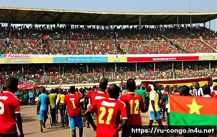 콩고 공화국에서 인기 있는 스포츠 팀 및 선수 - A vibrant scene at a bustling football stadium in Brazzaville, Republic of Congo, featuring a divers...
